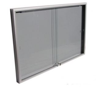 Závesná vitrína s úzkym profilom s posúvnymi sklami Název: Formát 15xA4, rozmer: šírka 1220 x výška 104 x hĺbka 69mm